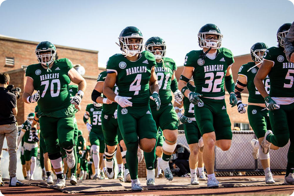 Football players running out